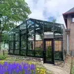 How Do I Choose Between a Sunroom and a Greenhouse? A Simple Guide for Homeowners