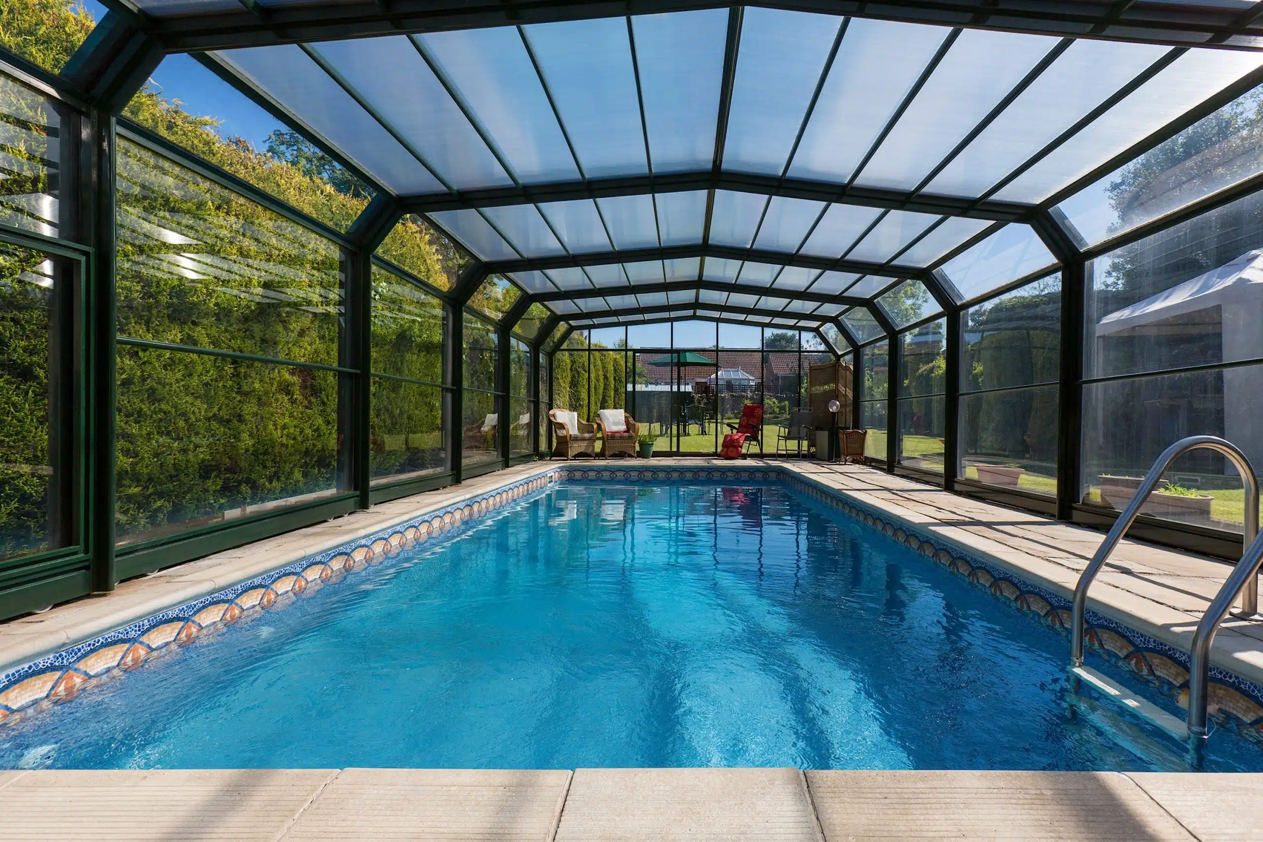 Luxury glass pool enclosure design